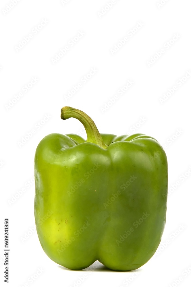 a green pepper isolated on white background a green pepper isolated on white background