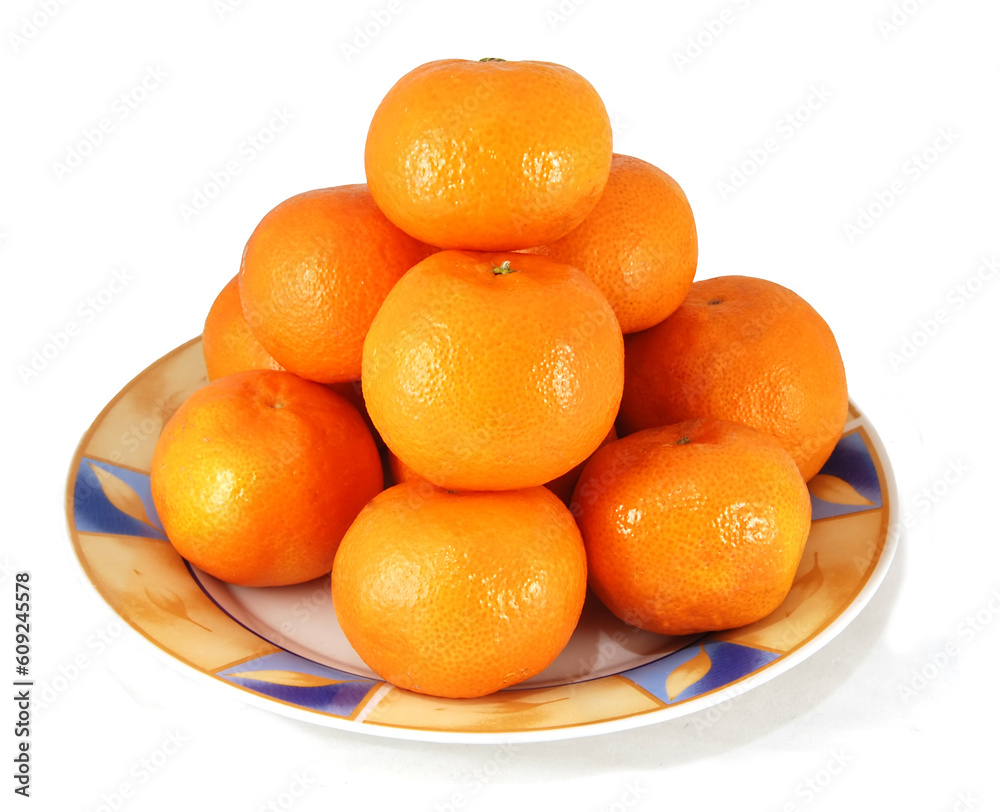 Tangerines on a plate against white background Tangerines on a plate against white background