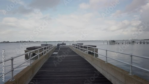 Wallpaper Mural  Looking west from the fishing pier at Jungle Prada de Narvaez Park in St. Petersburg, FL. Sunny day wide angle view blue sky with white clouds.
 Torontodigital.ca