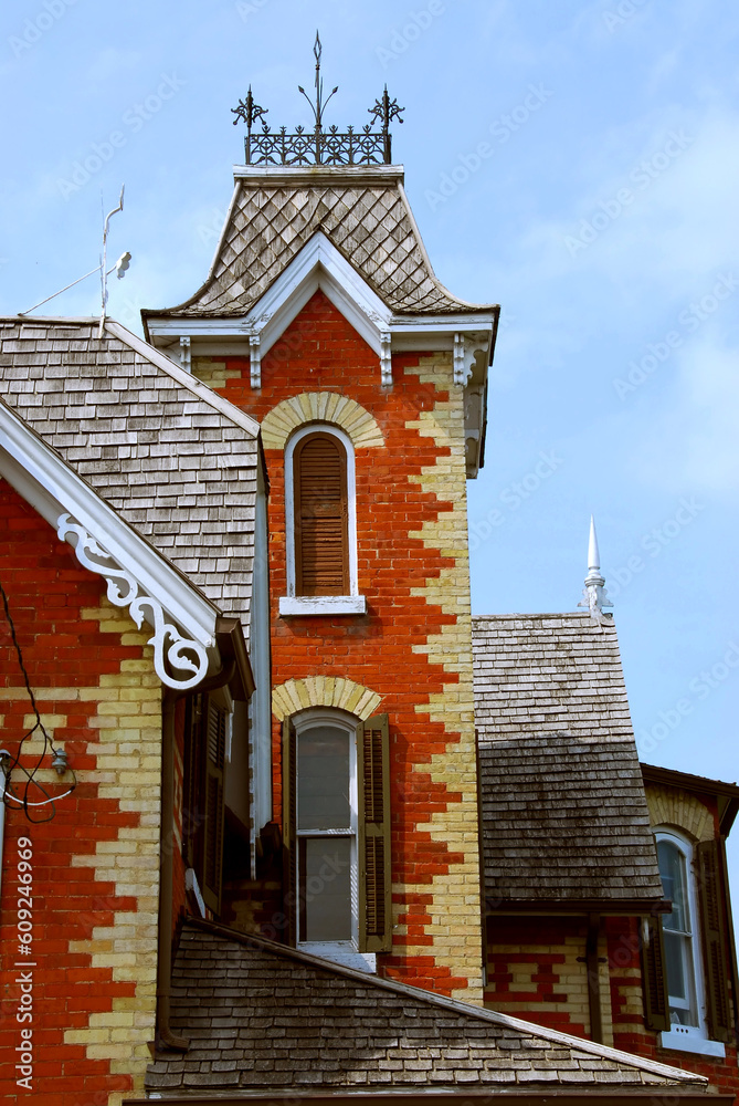 Fragment of a beautiful red brick victorian house