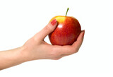 womans's hand with red apple