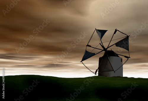 Silhouette of a windmill at the sunset