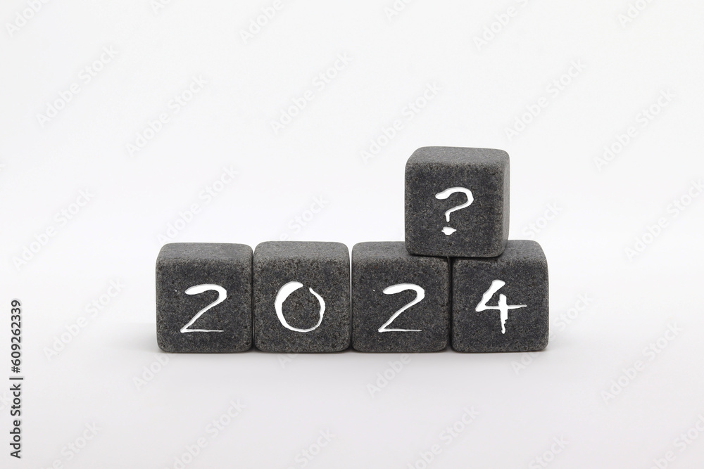 The inscription 2024 with a question mark on the cubes, white ...