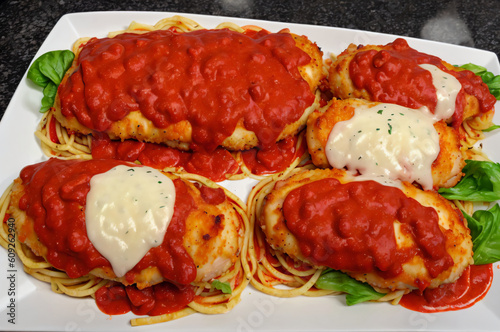 Spaghetti with meatballs and tomato sauce on a white plate generative AI