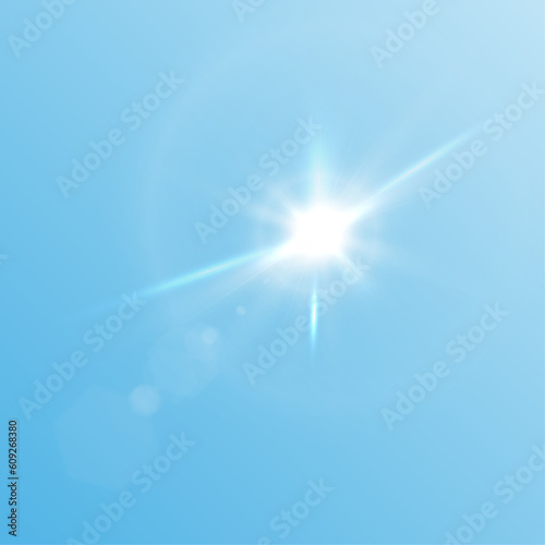 The effect of bright sunlight. Twinkling golden star on a blue background. Bright light effect.