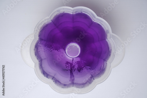 purple jelly in the form of a flower photographed flat lay