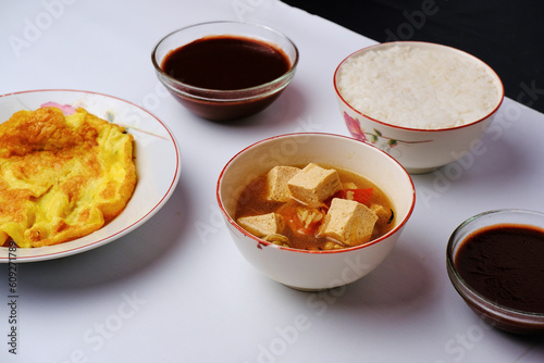 tofu sauce, eggs, white rice and jelly as a delicious food