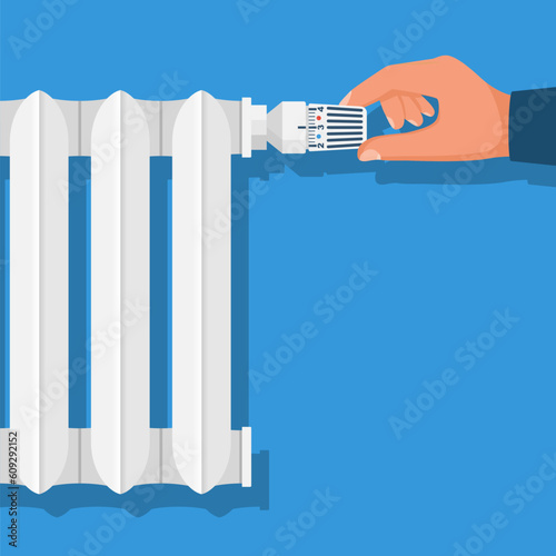Man regulates the thermostat controller in the house. Heating thermostat. Adjusting radiator temperature. Vector illustration flat design. Isolated on white background.