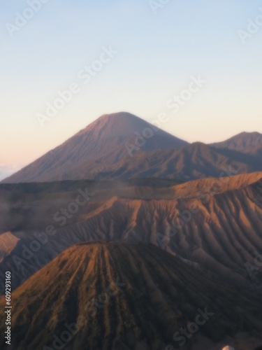 volcano in island The body shape of Mount Bromo is linked between valleys and canyons with a caldera or sea of sand covering an area of about 10 square kilometers. It has a crater with a diameter of ±
