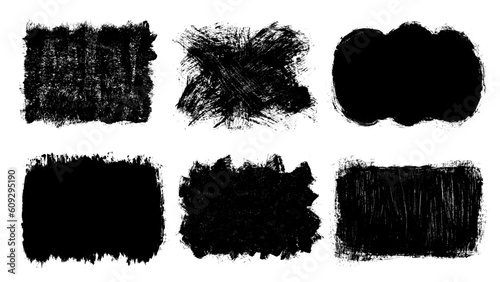 Set of black abstract brush strokes. Ink stain isolated on white background. Grainy textured design elements. Vector illustration, eps 10.