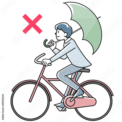傘をさして自転車で走る若い男性