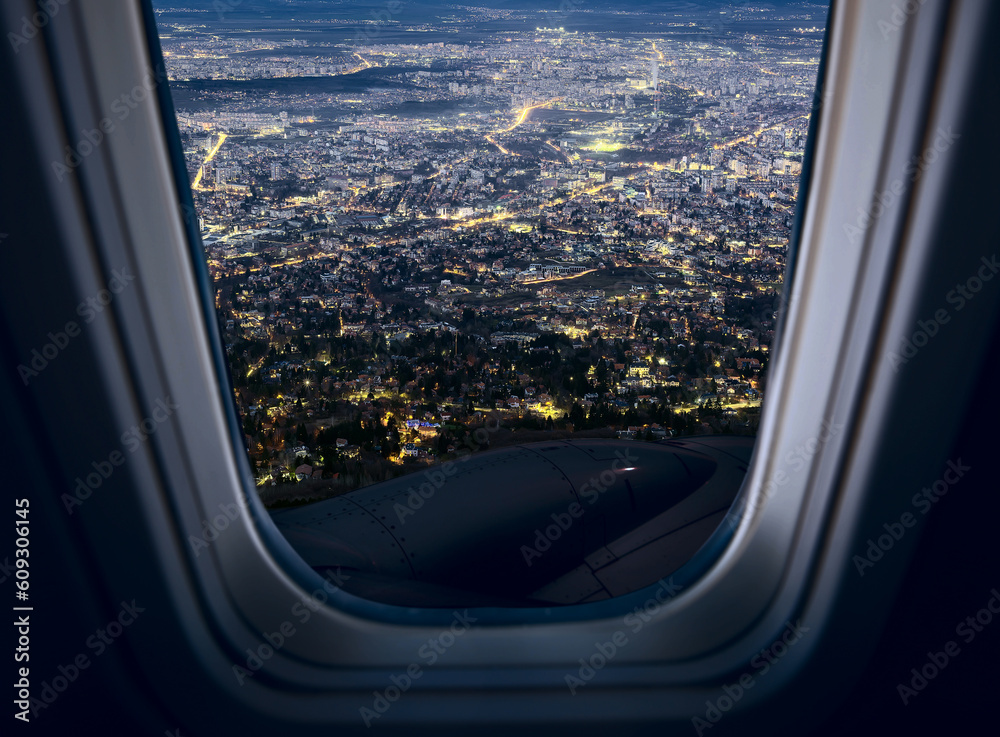 The capital of Bulgaria is Sofia. View of the city at night through the porthole. The capital of Bulgaria is Sofia. View of the city at night through the porthole.