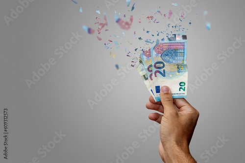 Fotografie Inflation or loss of Money Euro vanishing into nothing