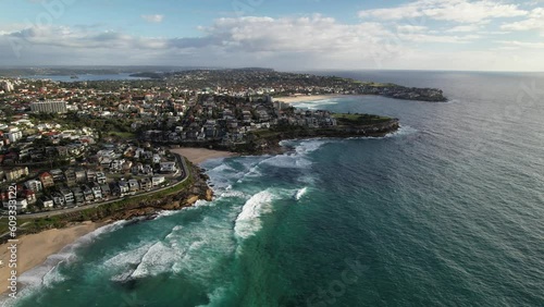 Aerial landscape panning across Bondi, Tamarama and Bronte Beach, NSW. Drone 4K photo