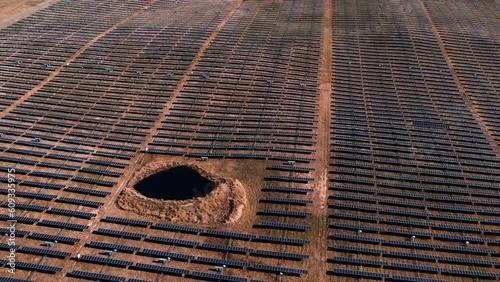 Aerial landscape panning over Solar Panel Farm near Tuggeranong, ACT Drone 4K