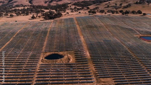 Aerial landscape panning over Solar Panel Farm near Tuggeranong, ACT Drone 4K