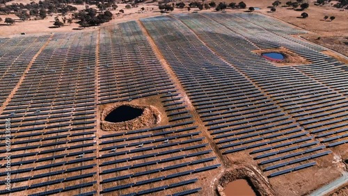 Aerial landscape panning over Solar Panel Farm near Tuggeranong, ACT Drone 4K