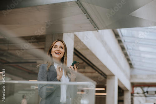 Young business woman using ...