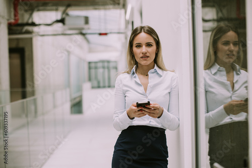 Young business woman using ...