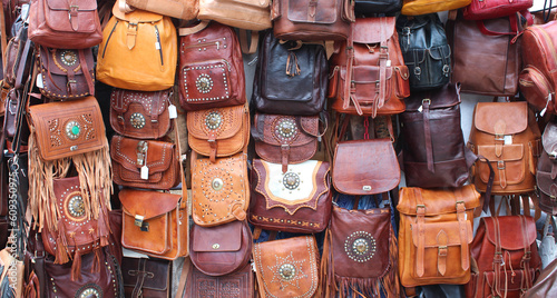 Stall of handmade leather saddlebags in a market © Brad Pict