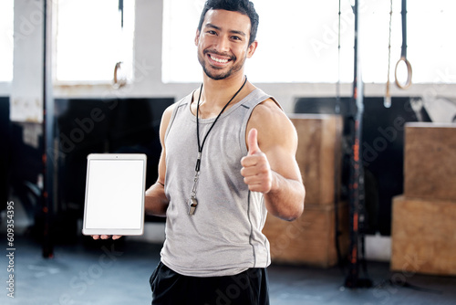 Obraz na plátně Portrait, thumbs up and man with tablet screen in gym for mockup after exercise