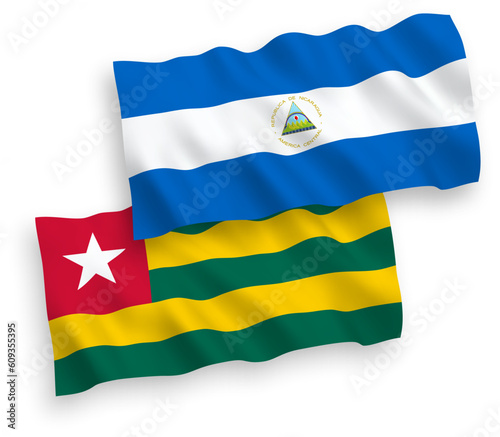 Flags of Togolese Republic and Nicaragua on a white background