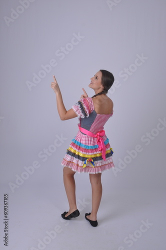 mulher sorridente com vestido de festa junina, festa de são joão  photo