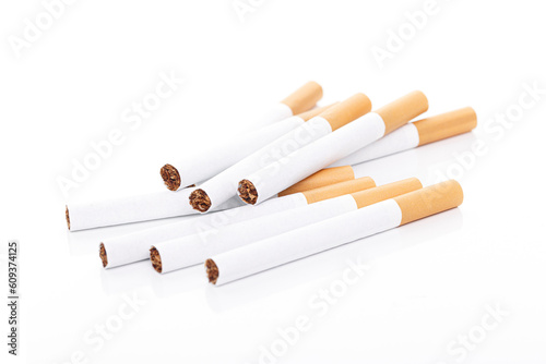 Close up of a smoking cigarettes on white background, Cigarette, tobacco in roll paper with filter tube