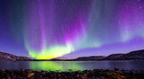 beautiful northern lights seen from iceland at night in a big lake