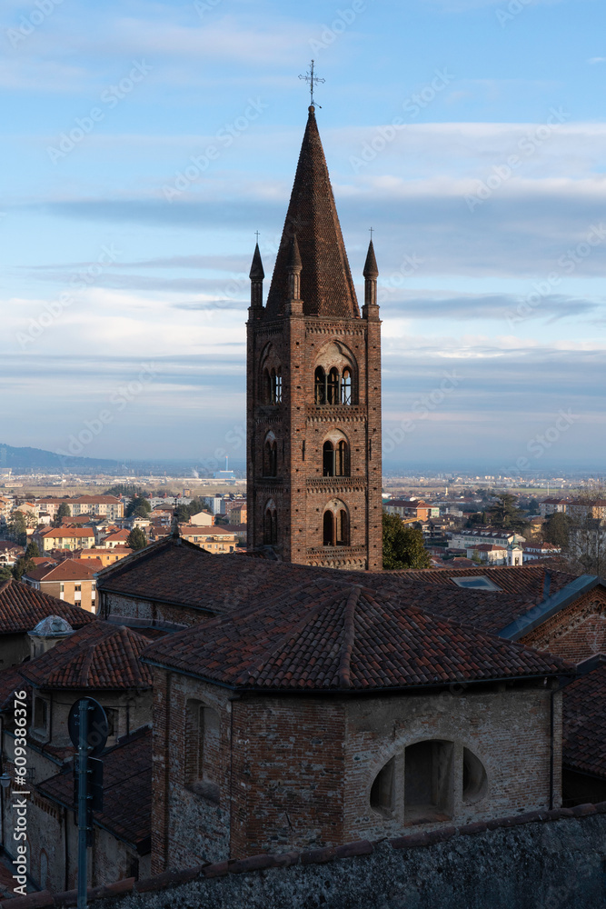 view of the Santa Maria christian church and bell tower in Rivoli historical city centre. Metropolitan City of Turin, Piedmont, Italy.