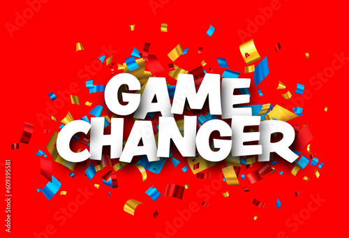 Game changer sign over colorful cut out foil ribbon confetti background..