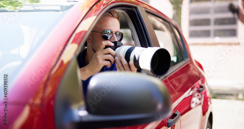 Private Spy In Car Taking Photos