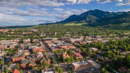 aerial shot of Boulder Colorado with Broadway street and flatirons mountain photo