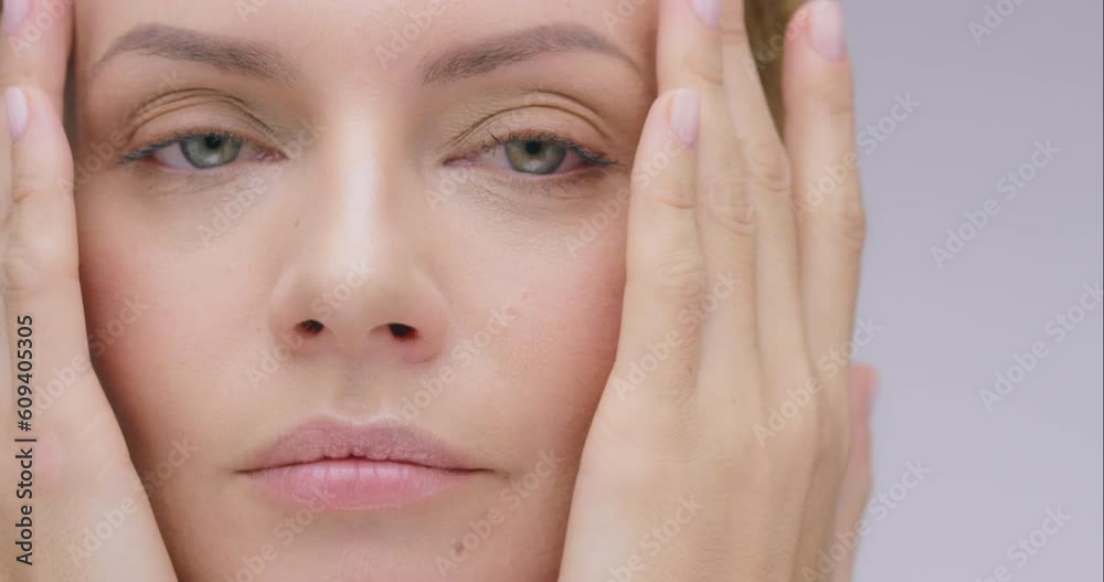 Face, moisturizing cream and skin of woman in studio for skincare, natural glow and health cosmetics. Portrait of aesthetic model person with hands on facial massage, dermatology wellness and beauty Face, moisturizing cream and skin of woman in studio for skincare, natural glow and health cosmetics. Portrait of aesthetic model person with hands on facial massage, dermatology wellness and beauty