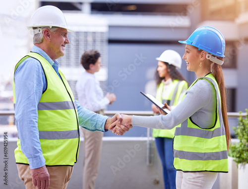 Construction people, handshake and business deal of architect management on a job site. Engineering team, shaking hands and staff with agreement, achievement and surveyor contract with happiness