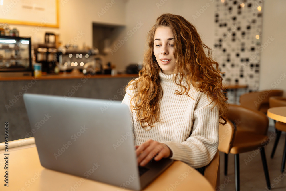 Young woman with laptop at home. Freelance, online course, remote work and lifestyle concept. Online shopping with laptop Young woman with laptop at home. Freelance, online course, remote work and lifestyle concept. Online shopping with laptop