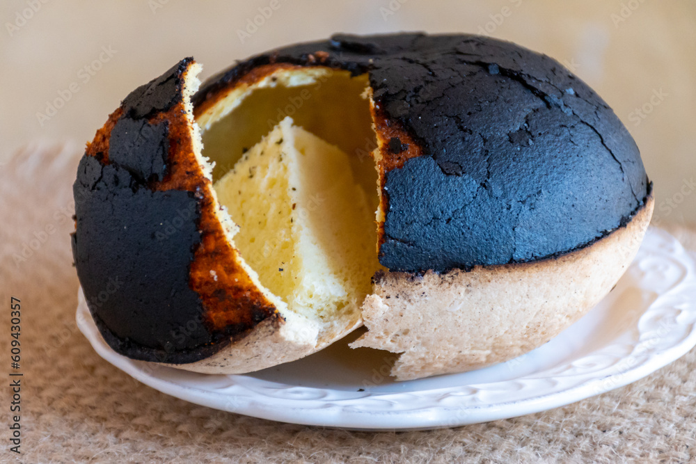 Special round black cake made from eggs and butter in Poitou, France Special round black cake made from eggs and butter in Poitou, France