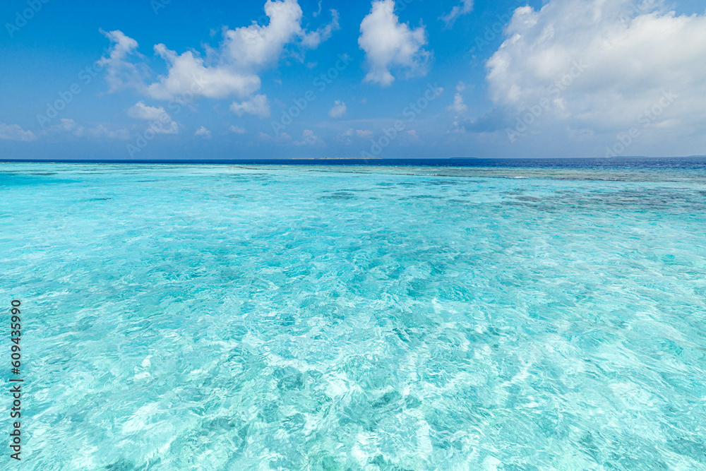 Sunny blue sea and sky. Clear calm ocean bay, peaceful waves. Earth environment day concept. Seascape relaxing clouds. Tourism island coast, beach landscape. Horizon peaceful water surface skyline