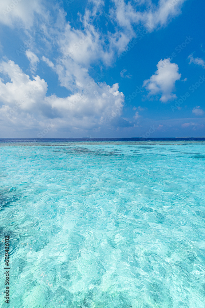 Sunny blue sea and sky. Clear calm ocean bay, peaceful waves. Earth environment day concept. Seascape relaxing clouds. Tourism island coast, beach landscape. Horizon peaceful water surface skyline