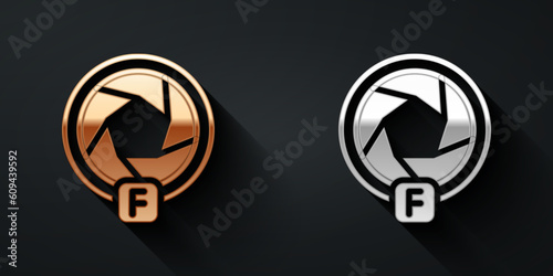 Gold and silver Camera shutter icon isolated on black background. Long shadow style. Vector