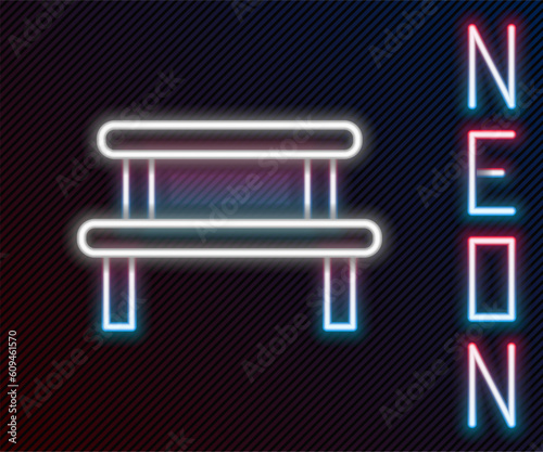 Glowing neon line Sauna wood bench icon isolated on black background. Colorful outline concept. Vector