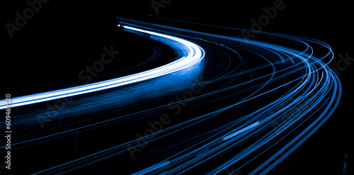 Night road lights. Lights of moving cars at night. long exposure