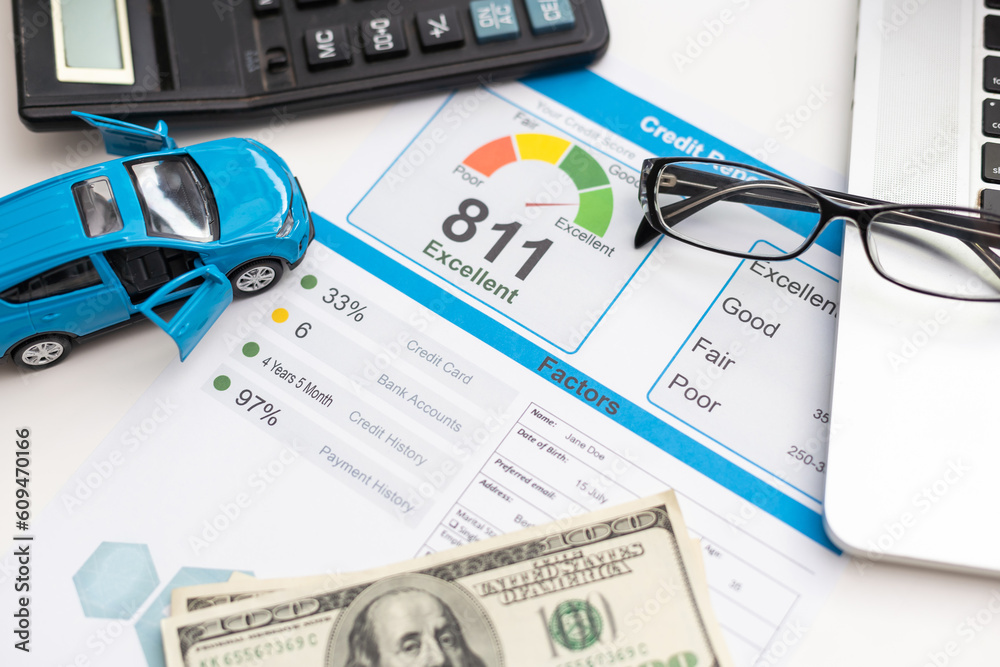 Credit report with score on a desk Credit report with score on a desk