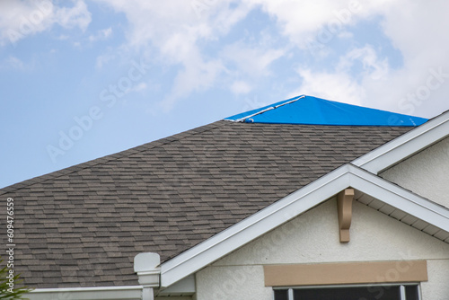 Tarped Hurricane damaged house