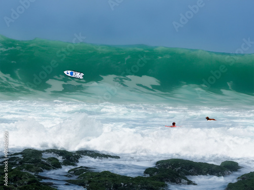 Canvas Print man and dog at tsunami wave the end