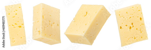 Pieces of cheese isolated on white background. Cheese for pizza. Cheese cut into squares on a white background, close-up. To insert into a design or project photo