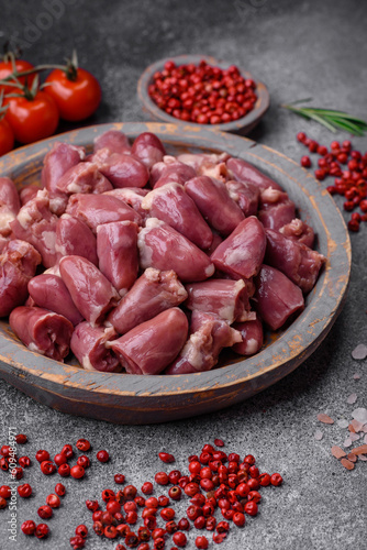 Raw chicken or turkey hearts with salt, spices and herbs