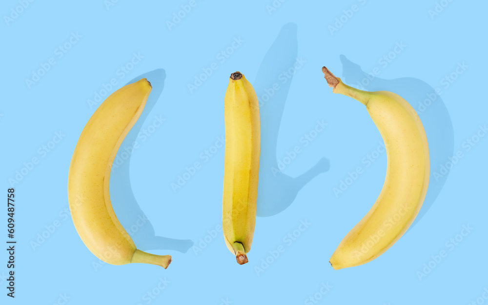 Yellow banana on blue pastel background