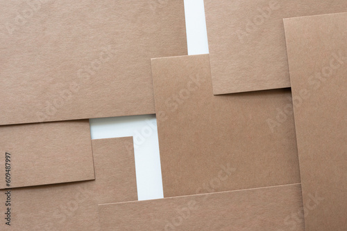 partly layered plain brown paper card background with minimalist aesthetic