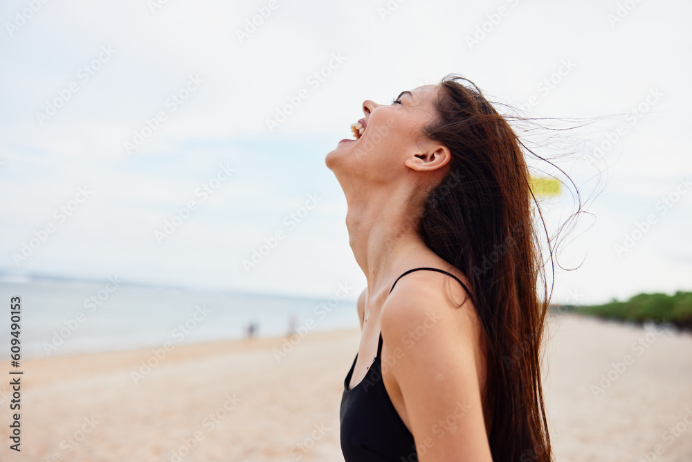 smile woman ocean happiness sea young vacation summer sand nature beach
